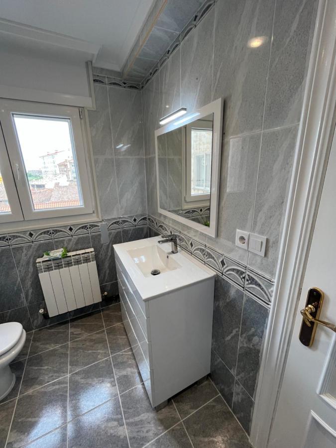 Apartamentos C&E อาโร ภายนอก รูปภาพ